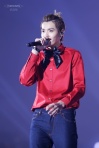 Kris in a red shirt with a bow tie