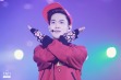 Suho in red sweater and cap